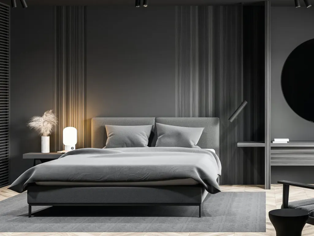 Chambre gris anthracite aux tasseaux de bois, sol en chevrons de chêne clair